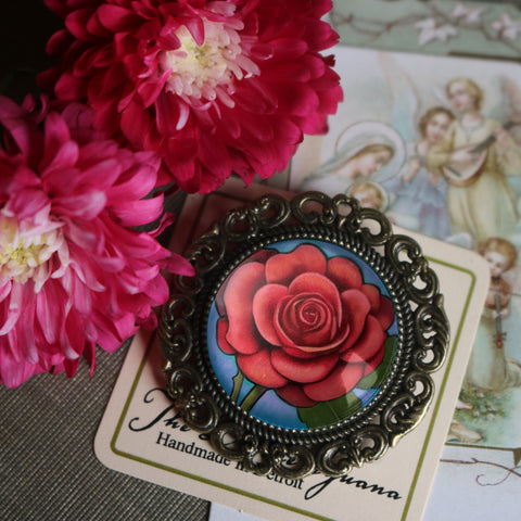 Sweet Rose Ornate Glass Cabochon and Brass Brooch