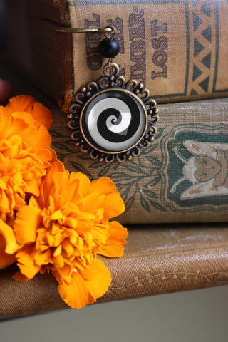 Hypnotist Black and White Spiral Swirl Glass Cabochon Brass Book Hook / Bookmark
