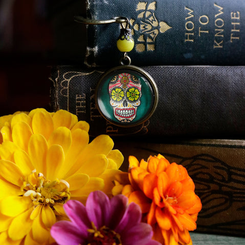 Sugar Skull with Yellow Eyes Glass Cabochon Day of the Dead Brass Book Hook / Bookmark