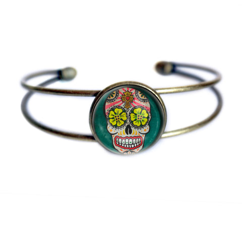 Sugar Skull with Yellow Eyes Day of the Dead Cuff Bracelet with Glass Cabochon on Bronze