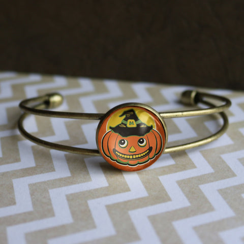 Jack O Lantern in Witch Hat Goth / Halloween Cuff Bracelet with Glass Cabochon on Bronze