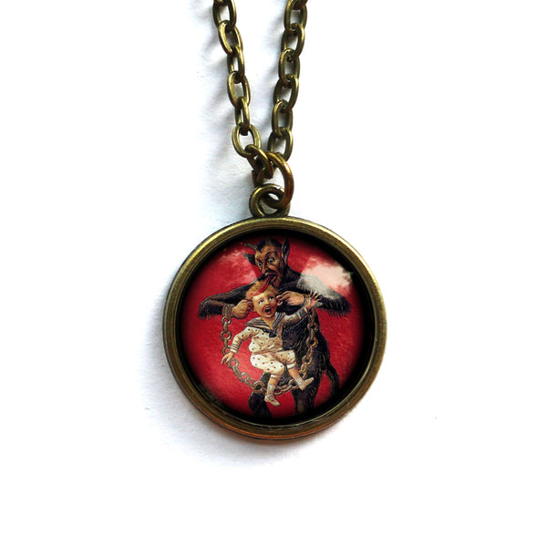 Krampus the Christmas Demon Large Pendant Necklace with Naughty Child Carried by the Ears