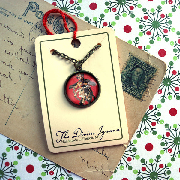 Krampus the Christmas Demon Large Pendant Necklace with Naughty Child Carried by the Ears