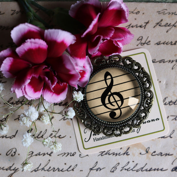Treble Clef Reversed Decoupage Glass and Brass Brooch for Musicians