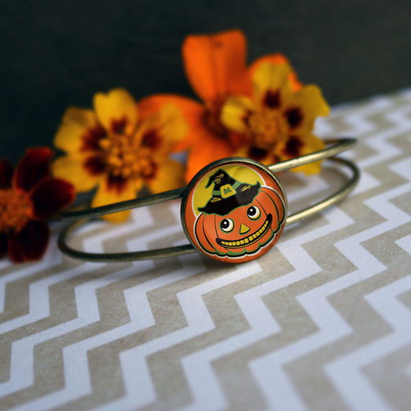 Jack O Lantern in Witch Hat Goth / Halloween Cuff Bracelet with Glass Cabochon on Bronze