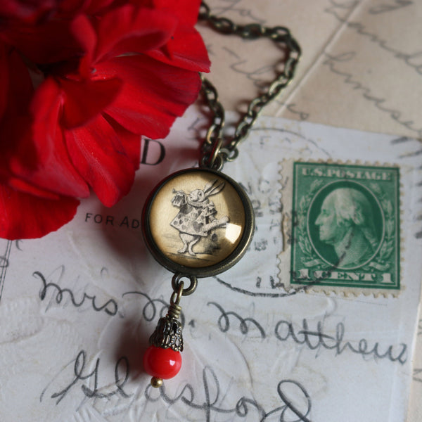 Alice in Wonderland White Rabbit Double-Sided Pendant Necklace with Red Glass Bead