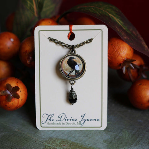 Crow or Raven Silhouette on Orange Moon Reversible Pendant Necklace with Bead Accent