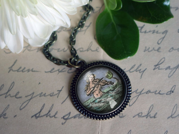 Ancient Mermaid Reversed Decoupage Glass Cabochon Pendant Necklace in Bronze Bezel