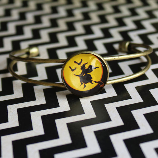 Flying Witch Retro Inspired Cuff Bracelet - Glass Cabochon in Brass Bezel