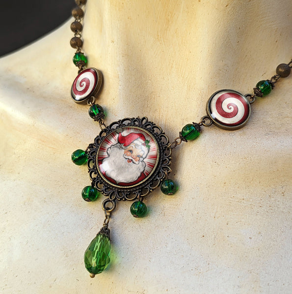 Retro Santa Claus Ornate Christmas Holiday Necklace with Brass Filigree and Green Beaded Accents